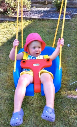 Lily and her swing. Lily and her swing.