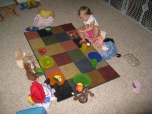 Dinner with her dolls.