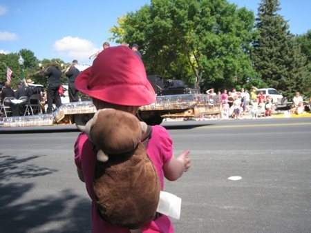 Lily enjoying the parade. Lily enjoying the parade.
