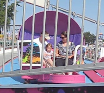 Lily's first Tilt A Whirl Ride